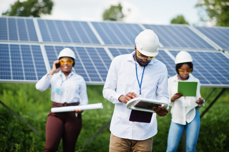 African american technician checks the maintenance of the solar
